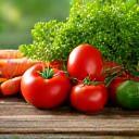 Fresh farm vegetables and organic food on rustic wooden table